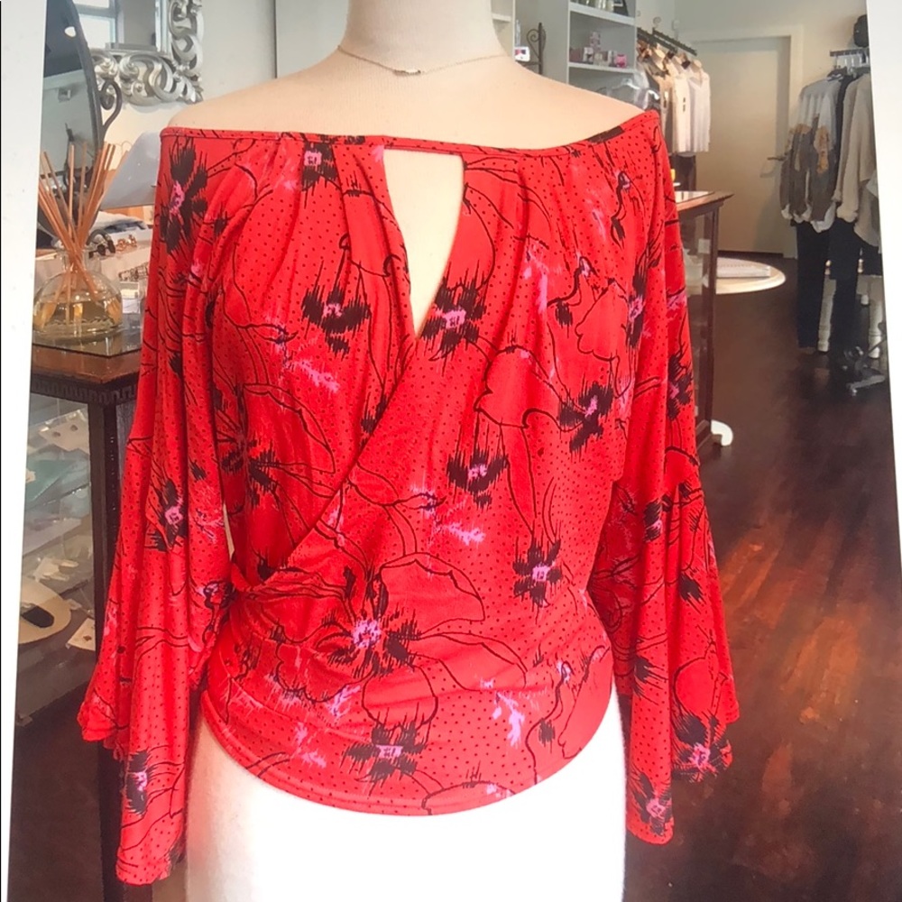 Free People printed last time top in orange